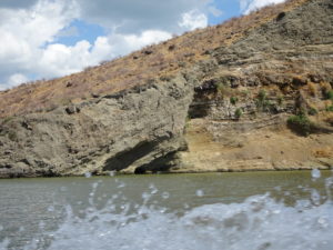 The upper volcanic layer slumping off into the water on Central Island